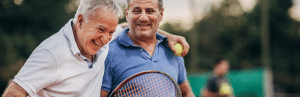Live Young Live Well 2 senior men play Tennis