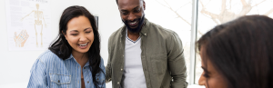 Couple getting fertility counselling smiling