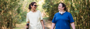 Manage Burnout - 2 women mindful walk in park