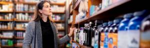 supplements webinar_woman choosing in store