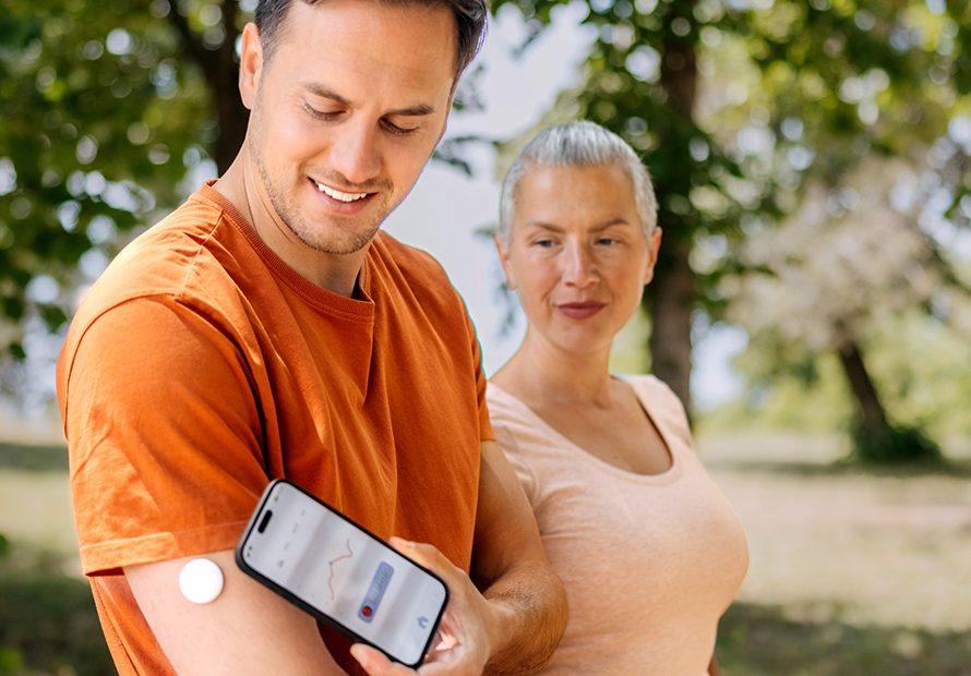 checking blood glucose while on walk