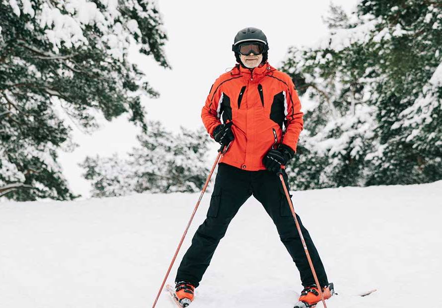senior man happy skiing