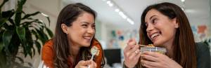 The Luteal Phase: Nourishment for Balance and Energy 2 2-women-looking-at-eachother-smiling-eating