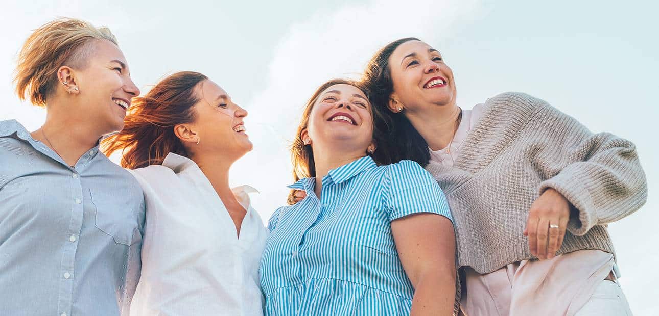 Menopause webinar April 2026_blog header_4 women friends sun smile